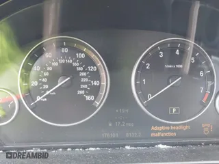 2012 BMW 5 Series 528i xDrive with VIN WBAXH5C54CDW07346, listed as a IAAI auction lot 41637038 with 176,101 mi miles. Bid and sale history available at carsss.com. Image 7.