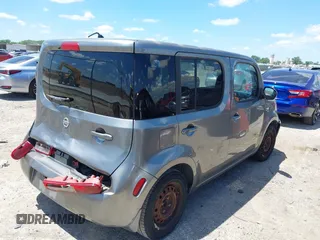 2010 Nissan Cube S z VIN JN8AZ2KR2AT156692, wystawiony jako IAAI lot #42243306 z przebiegiem 105 856 mil mil oraz . Historia ofert i sprzedaży dostępna na DreamBid. Obrazek 4.