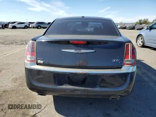 2013 Chrysler 300 C with VIN 2C3CCAKG0DH683117, listed as a Copart auction lot 74812334 with 187,308 mi miles and Salvage Title. Bid and sale history available at DreamBid. Image 6.