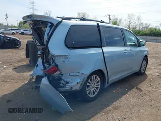 2015 Toyota Sienna XLE with VIN 5TDYK3DC3FS609947, listed as a IAAI auction lot 42097199 with Not provided miles and . Bid and sale history available at DreamBid. Image 4.