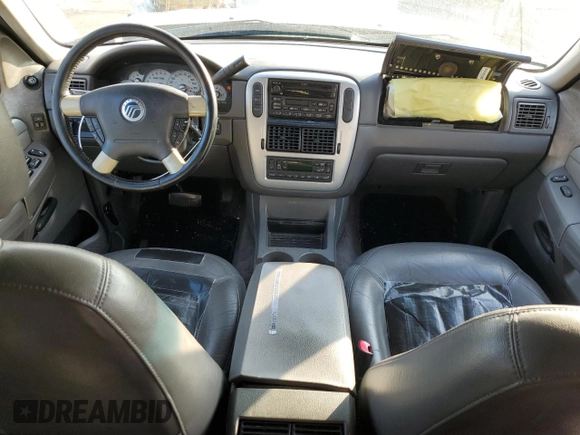 2002 Mercury Mountaineer Convenience z VIN 4M2ZU66W72ZJ38041, wystawiony jako Copart lot #86024514 z przebiegiem 264 952 mil mil oraz Szkoda całkowita • Salvage title. Historia ofert i sprzedaży dostępna na DreamBid. Obrazek 8.