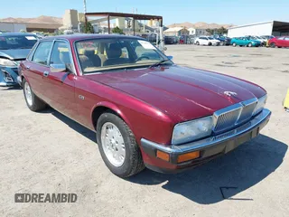 1994 Jaguar XJ with VIN SAJHX1749RC696626, listed as a IAAI auction lot 42746495 with 127,906 mi miles and . Bid and sale history available at DreamBid. Image 1.