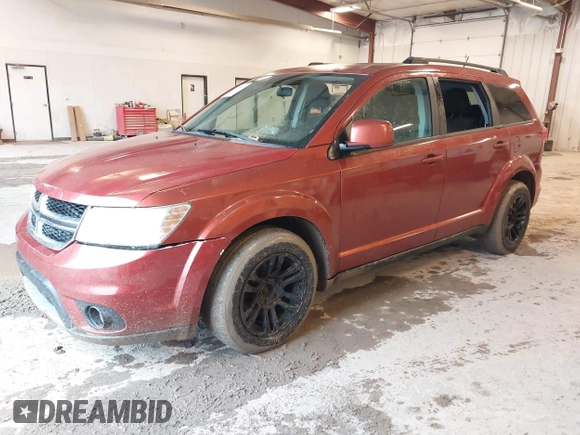 2013 Dodge Journey SXT with VIN 3C4PDCBG1DT674911, listed as a IAAI auction lot 41713407 with 153,757 mi miles and . Bid and sale history available at DreamBid. Image 2.