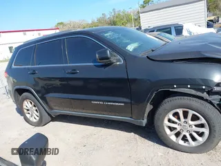 2014 Jeep Grand Cherokee Laredo with VIN 1C4RJEAG7EC263590, listed as a IAAI auction lot 41699106 with 136,581 mi miles and . Bid and sale history available at DreamBid. Image 14.
