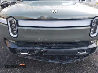 2022 Rivian R1S Launch Edition with VIN 7PDSGABL4NN000409, listed as a IAAI auction lot 41433164 with 39,603 mi miles. Bid and sale history available at carsss.com. Image 6.