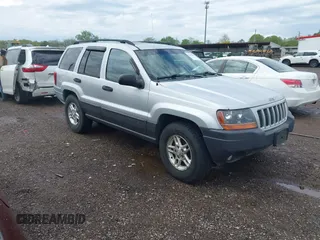 2004 Jeep Grand Cherokee Laredo with VIN 1J4GW48N64C420946, listed as a IAAI auction lot 42187005 with 215,921 mi miles and . Bid and sale history available at DreamBid. Image 1.