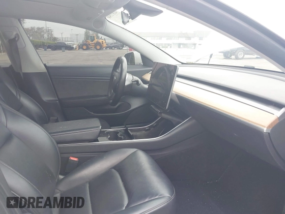 2020 Tesla Model 3 Long Range with VIN 5YJ3E1EB0LF803217, listed as a IAAI auction lot 41871940 with 130,391 mi miles. Bid and sale history available at carsss.com. Image 5.