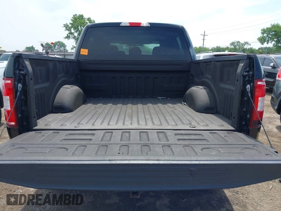 2018 Ford F-150 XL with VIN 1FTEW1EP1JKD05142, listed as a IAAI auction lot 42473177 with 99,079 mi miles and . Bid and sale history available at DreamBid. Image 18.