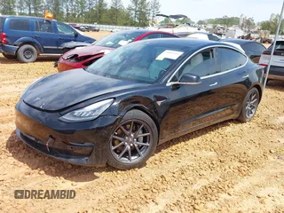 2018 Tesla Model 3 Long Range Battery with VIN 5YJ3E1EB1JF122786, listed as a IAAI auction lot 42010451 with 85,510 mi miles and . Bid and sale history available at DreamBid. Image 2.