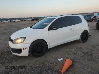2012 Volkswagen GTI w/Conv & Sunroof z VIN WVWEV7AJXCW252931, wystawiony jako Copart lot #84538064 z przebiegiem 126 899 mil mil oraz Szkoda całkowita • Salvage title. Historia ofert i sprzedaży dostępna na DreamBid. Obrazek 1.