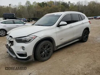 2017 BMW X1 sDrive28i with VIN WBXHU7C30H5H38049, listed as a Copart auction lot 51007915 with 52,963 mi miles and Salvage Title. Bid and sale history available at carsss.com. Image 1.