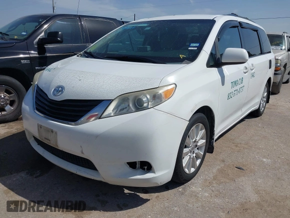 2014 Toyota Sienna LE with VIN 5TDJK3DC5ES081232, listed as a IAAI auction lot 41789629 with 397,033 mi miles and . Bid and sale history available at DreamBid. Image 17.