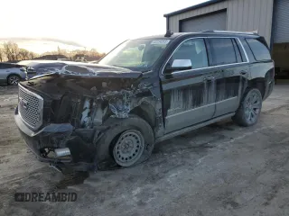 2015 GMC Yukon Denali with VIN 1GKS2CKJ0FR711491, listed as a Copart auction lot 45134265 with 82,285 mi miles and Salvage Title. Bid and sale history available at carsss.com. Image 1.