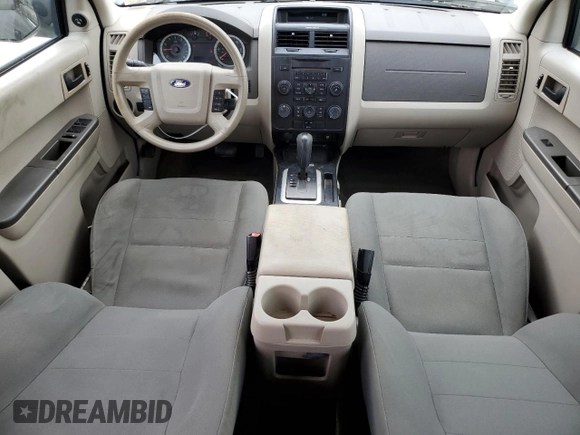 2012 Ford Escape XLS with VIN 1FMCU9C71CKA30319, listed as a Copart auction lot 60189745 with 214,736 mi miles and Salvage title. Bid and sale history available at DreamBid. Image 8.