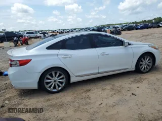 2013 Hyundai Azera z VIN KMHFH4JG4DA214345, wystawiony jako Copart lot #57491015 z przebiegiem 178 722 mil mil oraz Czysty tytuł • Clean title. Historia ofert i sprzedaży dostępna na DreamBid. Obrazek 4.