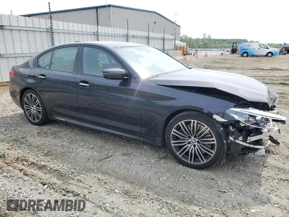 2018 BMW 5 Series 540i with VIN WBAJE5C53JWA94657, listed as a Copart auction lot 51058014 with 63,460 mi miles and Salvage Title. Bid and sale history available at carsss.com. Image 4.