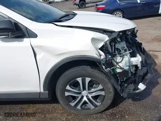 2018 Toyota RAV4 LE with VIN JTMZFREV9JJ192075, listed as a IAAI auction lot 41860513 with 64,586 mi miles. Bid and sale history available at carsss.com. Image 17.