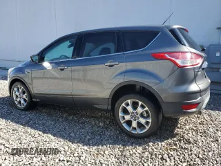 2013 Ford Escape SEL with VIN 1FMCU9HX9DUC36700, listed as a Copart auction lot 49236745 with 124,413 mi miles and Clean Title. Bid and sale history available at carsss.com. Image 2.