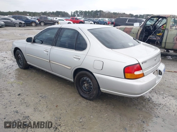 1999 Nissan Altima XE with VIN 1N4DL01D5XC180276, listed as a IAAI auction lot 41584645 with 248,376 mi miles. Bid and sale history available at carsss.com. Image 3.