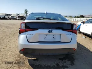 2022 Toyota Prius L Eco с VIN JTDKAMFU1N3177721, выставлен на аукционе Copart как лот 62401865 с пробегом 74 785 миль миль и Списание • Salvage title. История ставок и продаж доступна на DreamBid. Изображение 6.