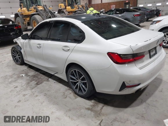 2019 BMW 3 Series 330i xDrive with VIN WBA5R7C55KAJ83482, listed as a IAAI auction lot 41565321 with 126,536 mi miles. Bid and sale history available at carsss.com. Image 3.
