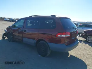 2002 Toyota Sienna CE with VIN 4T3ZF19C52U463405, listed as a IAAI auction lot 41658109 with 138,726 mi miles. Bid and sale history available at carsss.com. Image 3.