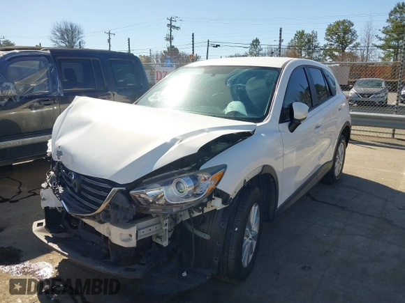2016 Mazda CX-5 Sport with VIN JM3KE2BY9G0890587, listed as a IAAI auction lot 41685344 with 91,190 mi miles. Bid and sale history available at carsss.com. Image 17.