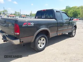 2002 Ford F-150 XL with VIN 1FTRX18L82NA18808, listed as a IAAI auction lot 42259883 with 154,519 mi miles and . Bid and sale history available at DreamBid. Image 4.