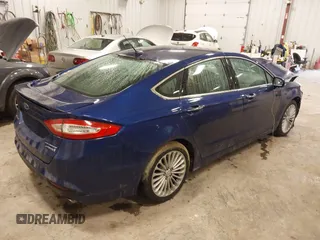 2013 Ford Fusion Titanium Hybrid with VIN 3FA6P0RU9DR320909, listed as a IAAI auction lot 41477530 with 108,153 mi miles. Bid and sale history available at carsss.com. Image 4.