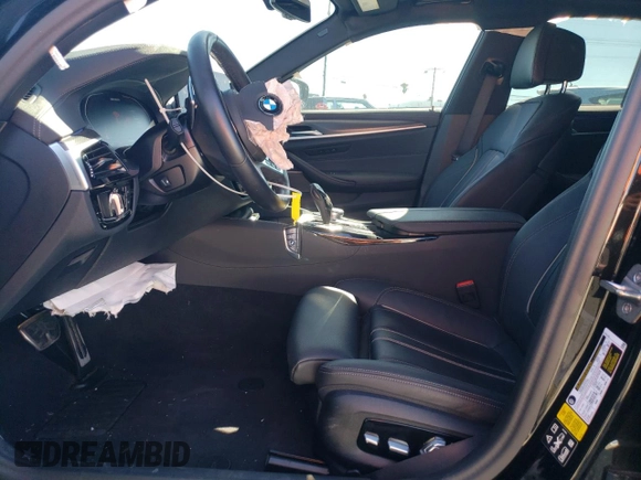 2023 BMW 5 Series M550i xDrive with VIN WBA13BK03PCM44838, listed as a Copart auction lot 68434874 with 17,798 mi miles and Salvage title. Bid and sale history available at DreamBid. Image 7.