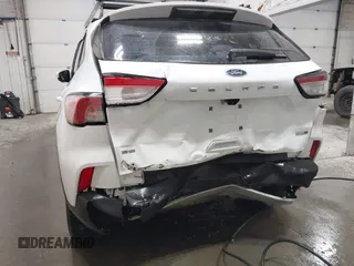 2020 Ford Escape SE z VIN 1FMCU9G62LUB80302, wystawiony jako IAAI lot #42610731 z przebiegiem 43 873 mil mil oraz . Historia ofert i sprzedaży dostępna na DreamBid. Obrazek 6.