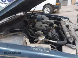 1990 Cadillac DeVille z VIN 1G6CD5331L4293427, wystawiony jako IAAI lot #41764635 z przebiegiem 198 499 mil mil oraz . Historia ofert i sprzedaży dostępna na DreamBid. Obrazek 13.