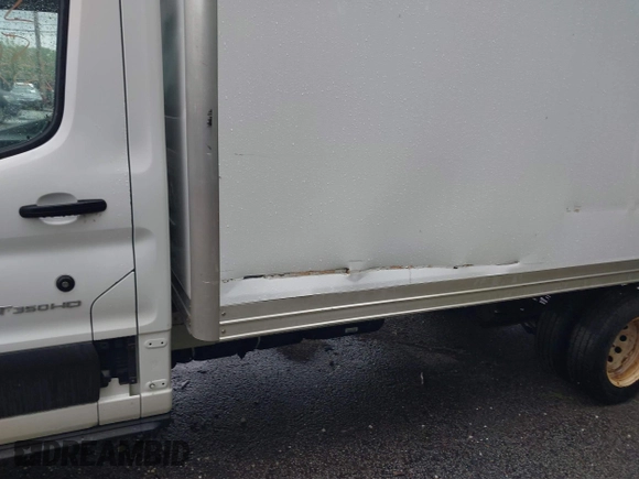 2019 Ford Transit with VIN 1FDBF8ZM4KKA83933, listed as a IAAI auction lot 42122507 with 110,177 mi miles and . Bid and sale history available at DreamBid. Image 6.