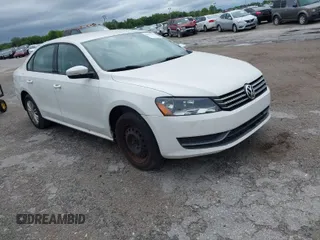 2014 Volkswagen Passat Wolfsburg Edition with VIN 1VWAS7A39EC096570, listed as a IAAI auction lot 41991191 with 59,918 mi miles and . Bid and sale history available at DreamBid. Image 1.