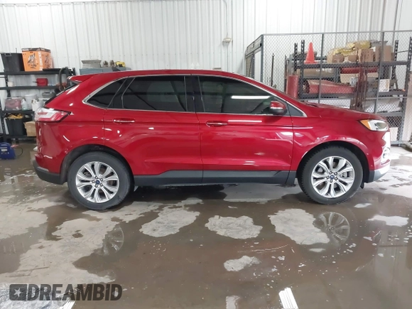 2020 Ford Edge Titanium z VIN 2FMPK4K98LBB39819, wystawiony jako IAAI lot #41947377 z przebiegiem 69 467 mil mil oraz . Historia ofert i sprzedaży dostępna na DreamBid. Obrazek 13.