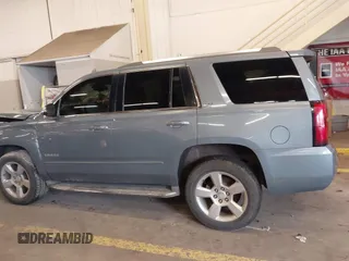 2016 Chevrolet Tahoe LTZ with VIN 1GNSKCKC3GR346276, listed as a IAAI auction lot 41646214 with 102,625 mi miles and . Bid and sale history available at DreamBid. Image 14.