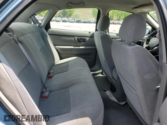 2006 Ford Taurus SE with VIN 1FAHP53296A241444, listed as a Copart auction lot 58343615 with 125,385 mi miles and Salvage title. Bid and sale history available at DreamBid. Image 10.