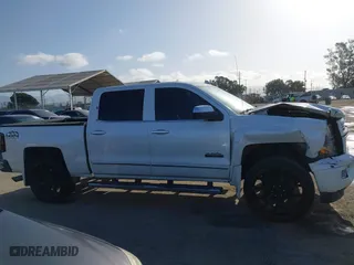 2015 Chevrolet Silverado 1500 High Country with VIN 3GCUKTEC6FG204564, listed as a IAAI auction lot 41953511 with 130,341 mi miles. Bid and sale history available at carsss.com. Image 13.