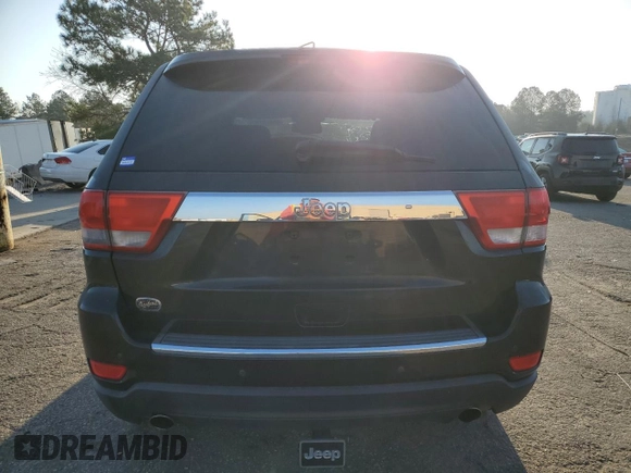 2011 Jeep Grand Cherokee Overland with VIN 1J4RS6GT5BC648076, listed as a Copart auction lot 48878135 with 223,263 mi miles and Salvage Title. Bid and sale history available at DreamBid. Image 6.
