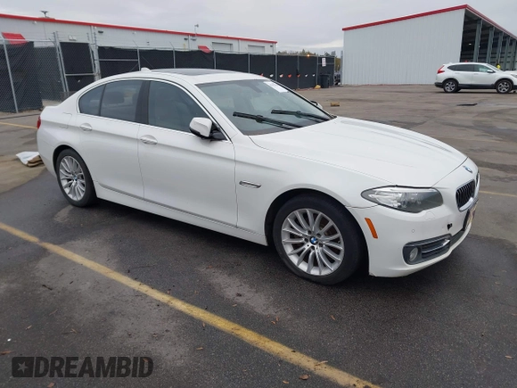 2015 BMW 5 Series 528i with VIN WBA5A5C5XFD516999, listed as a IAAI auction lot 41195184 with 131,187 mi miles. Bid and sale history available at carsss.com. Image 1.