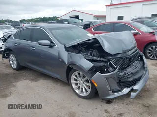 2021 Cadillac CT5 Luxury with VIN 1G6DX5RK7M0110762, listed as a IAAI auction lot 42426744 with 54,450 mi miles and . Bid and sale history available at DreamBid. Image 1.