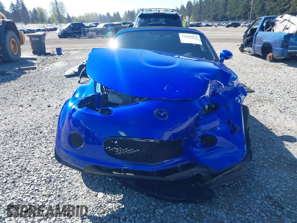 2006 Mazda MX-5 Miata Touring z VIN JM1NC25F560104482, wystawiony jako IAAI lot #42045035 z przebiegiem 131 892 mil mil oraz . Historia ofert i sprzedaży dostępna na DreamBid. Obrazek 13.