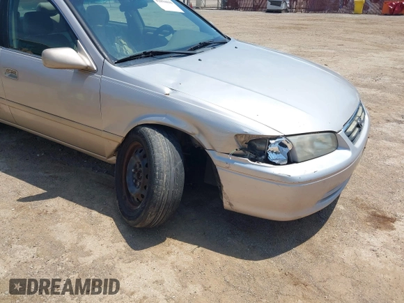 2000 Toyota Camry CE z VIN 4T1BG22K5YU731201, wystawiony jako IAAI lot #42094098 z przebiegiem Nie podano mil oraz . Historia ofert i sprzedaży dostępna na DreamBid. Obrazek 6.