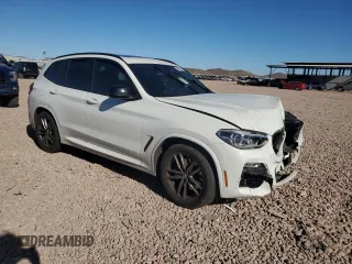 2019 BMW X3 M40i with VIN 5UXTS3C55KLR72211, listed as a Copart auction lot 88091235 with 61,859 mi miles and Salvage Title. Bid and sale history available at DreamBid. Image 4.