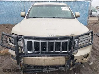 2011 Jeep Grand Cherokee Laredo with VIN 1J4RR4GG9BC563065, listed as a IAAI auction lot 41798136 with 192,149 mi miles. Bid and sale history available at carsss.com. Image 12.