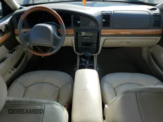 2001 Lincoln Continental with VIN 1LNHM97V91Y707951, listed as a Copart auction lot 79314694 with 111,605 mi miles and Salvage Title. Bid and sale history available at carsss.com. Image 8.