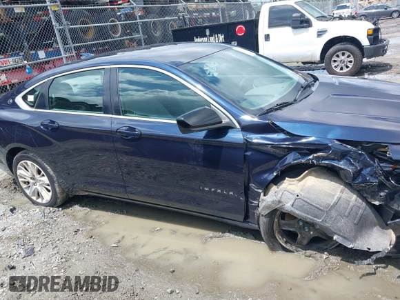 2015 Chevrolet Impala LS z VIN 2G11X5SL0F9214868, wystawiony jako IAAI lot #42417164 z przebiegiem 135 321 mil mil oraz . Historia ofert i sprzedaży dostępna na DreamBid. Obrazek 13.