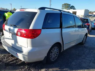 2009 Toyota Sienna XLE with VIN 5TDZK22C69S241205, listed as a IAAI auction lot 40980902 with 250,335 mi miles and . Bid and sale history available at DreamBid. Image 4.