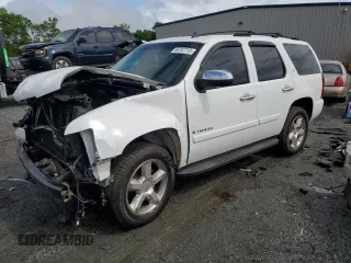 2007 Chevrolet Tahoe LTZ z VIN 1GNFC13J07R177477, wystawiony jako Copart lot #56707715 z przebiegiem 222 879 mil mil oraz Szkoda całkowita • Salvage title. Historia ofert i sprzedaży dostępna na DreamBid. Obrazek 1.