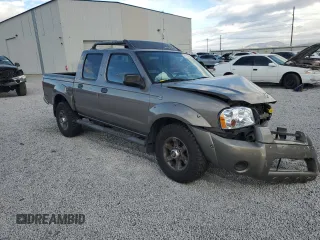 2003 Nissan Frontier XE with VIN 1N6ED27T73C433384, listed as a Copart auction lot 80153654 with 248,803 mi miles and Salvage title. Bid and sale history available at DreamBid. Image 4.